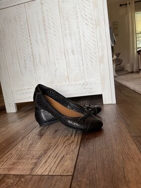 Clarks Black Perforated Leather Ballet Flats with Bow Accent
